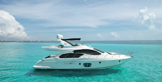 Azimut yacht on the turquoise sea under a blue sky