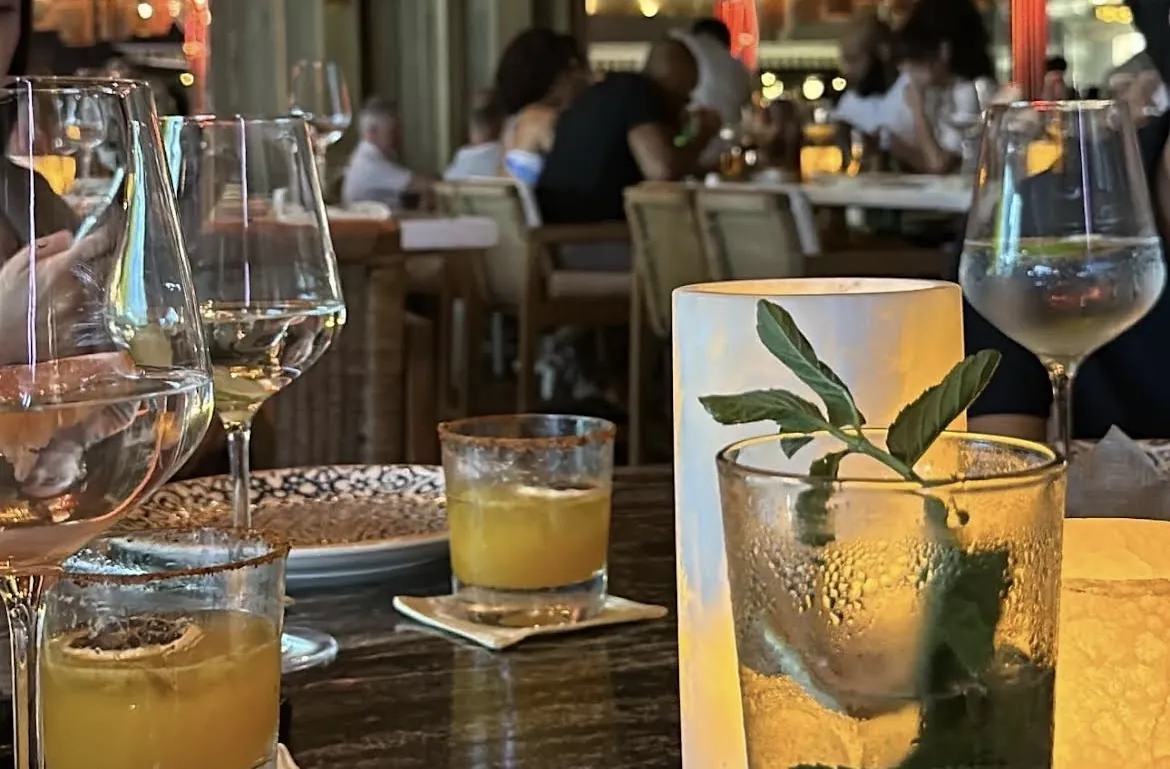 Cocktails with herbs on the restaurant table