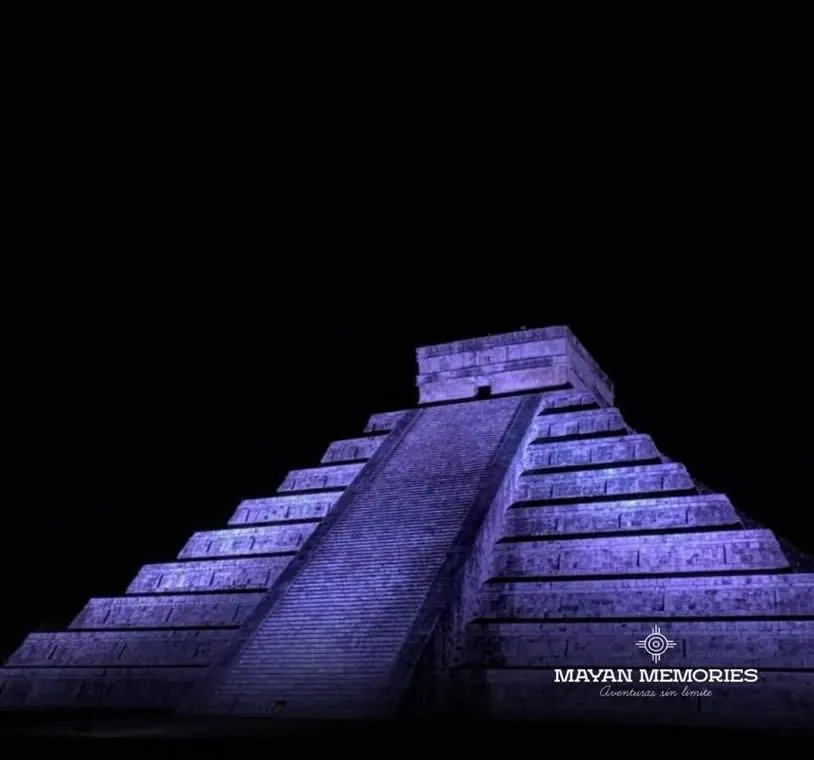 Kukulkán pyramid lit in purple at night