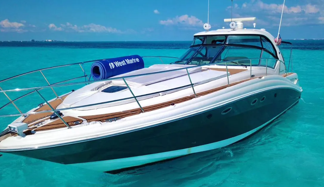 Sea Ray yacht cruising in turquoise water